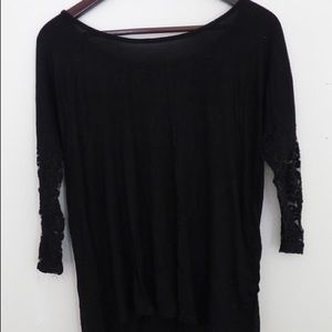 Black shirt with lace sleeves